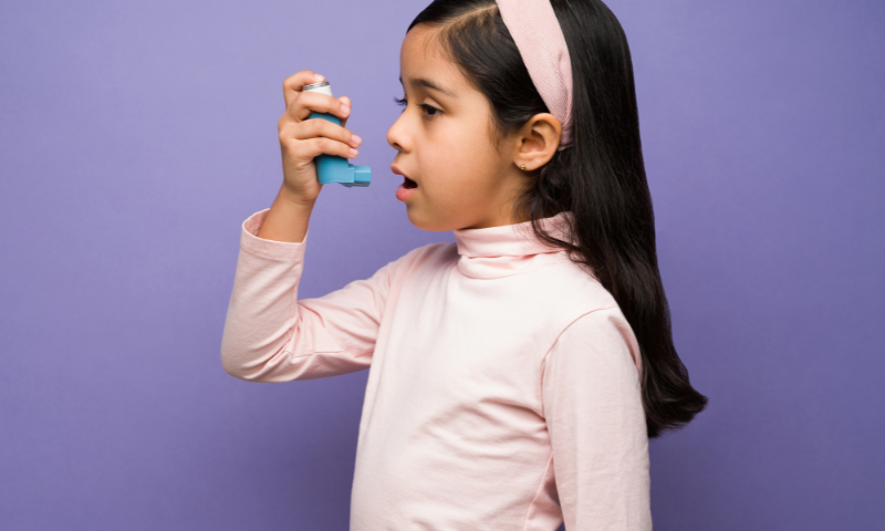 Child with an inhaler
